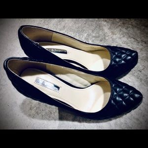 BCBG black quilted pumps